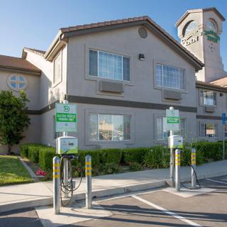 Granzella’s Inn | Williams, California | Front entrance of Granzella's Inn with electric car charging station